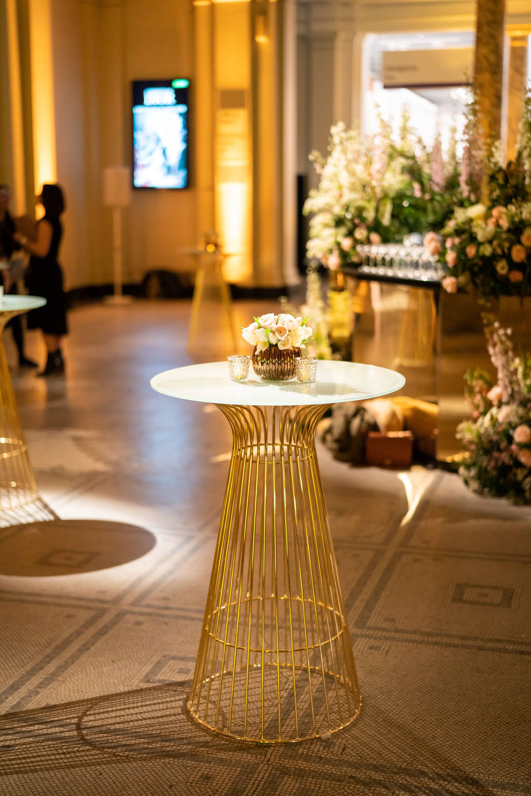 Gianni gold poseur table at the V&A, Gold bar and Gold Gianni poseur tables, gold cocktail tables
